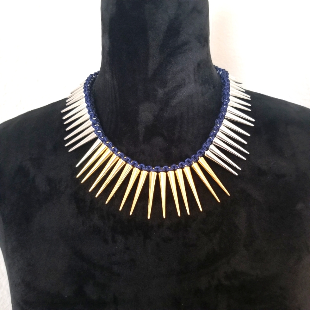 Gold tone/silver tone spiked bib necklace